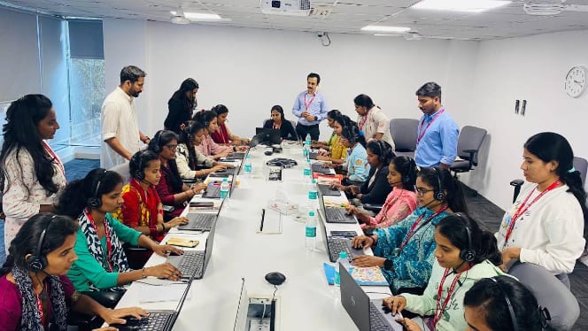 Candidates at Muthoot Finance taking customer care executive (CCE) certification test.