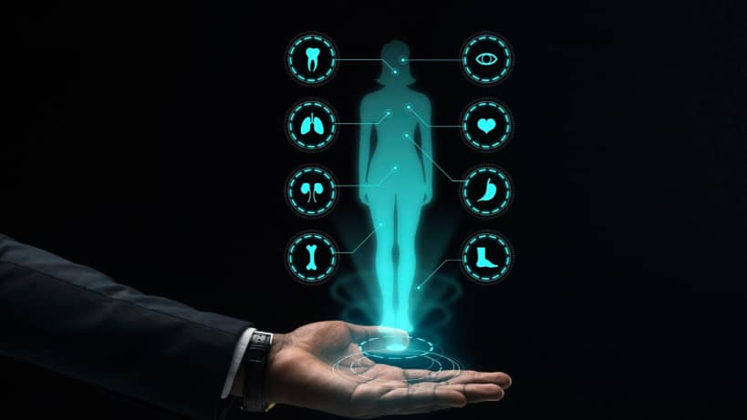A futuristic visualisation of digital healthcare: A holographic human body scan with interconnected organ diagnostics, symbolising how AI and telemedicine are revolutionising personalised, accessible, and data-driven health solutions.